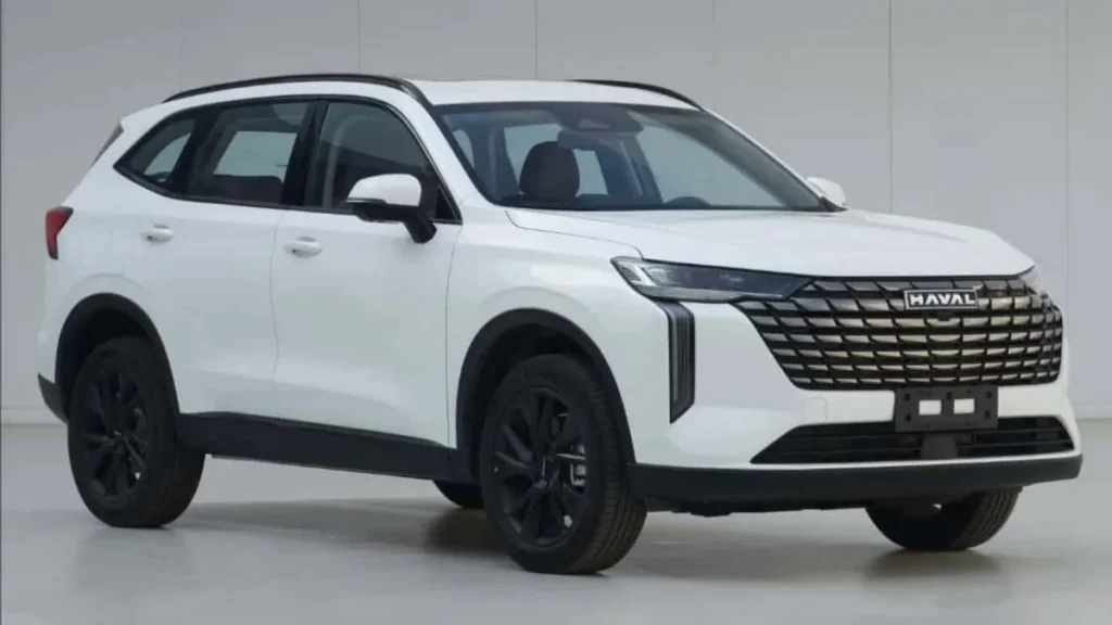 Novo Haval 2026 Híbrido Em Versão Brasileira, Suv Da Gwm Com Design Moderno, Faróis Em Led Acesos E Perfil Frontal Destacado Em Ambiente Urbano.