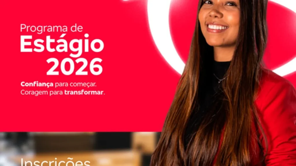 Jovem Profissional Em Ambiente Corporativo Utilizando Laptop Enquanto Anúncio Divulga Inscrições Abertas Para O Programa De Estágio Bradesco 2026.